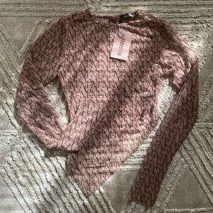 Mesh asymmetrical top